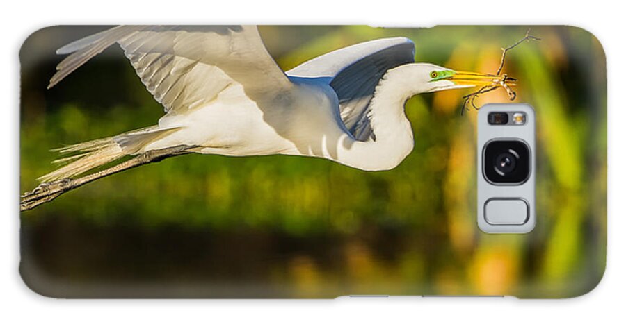 Wildlife Galaxy Case featuring the photograph Snowy Egret Flying with a Branch by Andres Leon