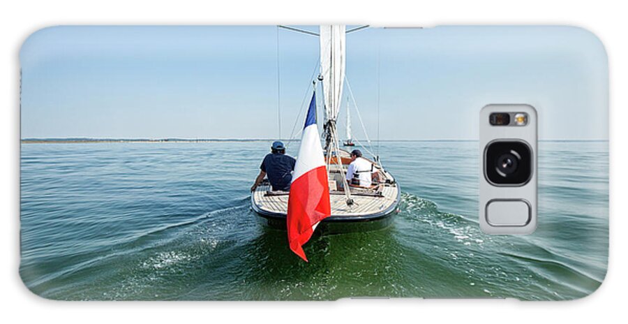 Arcachon Bay Galaxy Case featuring the photograph Two Men Sailing In Sailboat, Arcachon by Christophe Launay