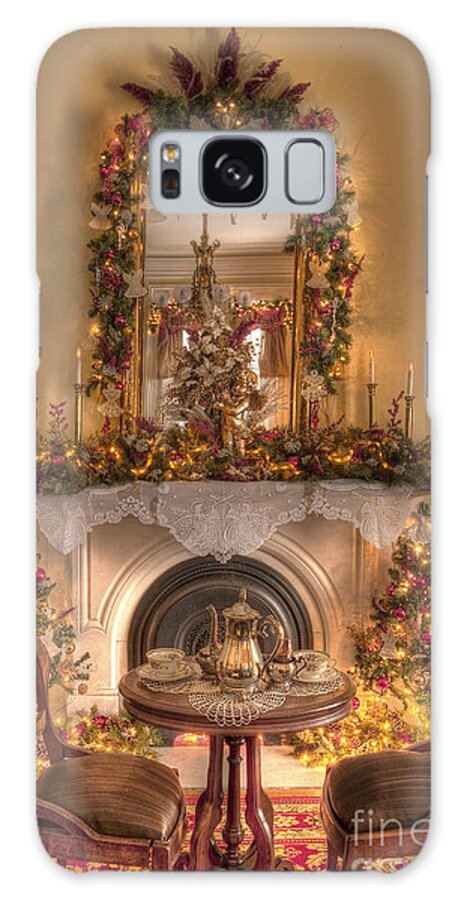 Inside; Indoors; Interior; Christmas; Wood; Rug; Victorian; Decorations; Ornaments; Lights; Seasonal; Season; Holiday; Table; Chairs; Tea; Tea Set; Cup; Saucer; Mirror; Fireplace; Still Life; Garland; Candles; Lights; Decore Galaxy S8 Case featuring the photograph Victorian Christmas by the Fire by Margie Hurwich