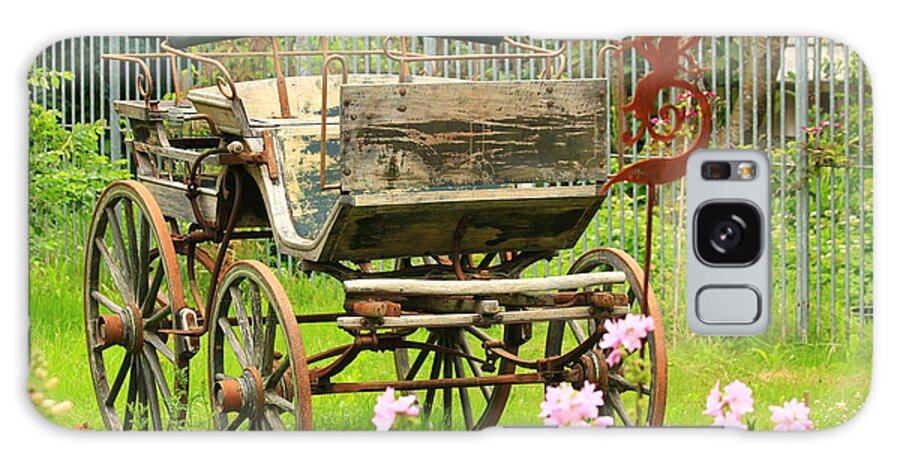 Aged Galaxy Case featuring the photograph Vintage horse carriage in a flower bed by Amanda Mohler