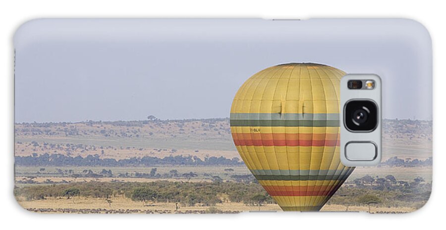 00761909 Galaxy Case featuring the photograph Hot Air Balloon Flying Over Wildebeest by Suzi Eszterhas