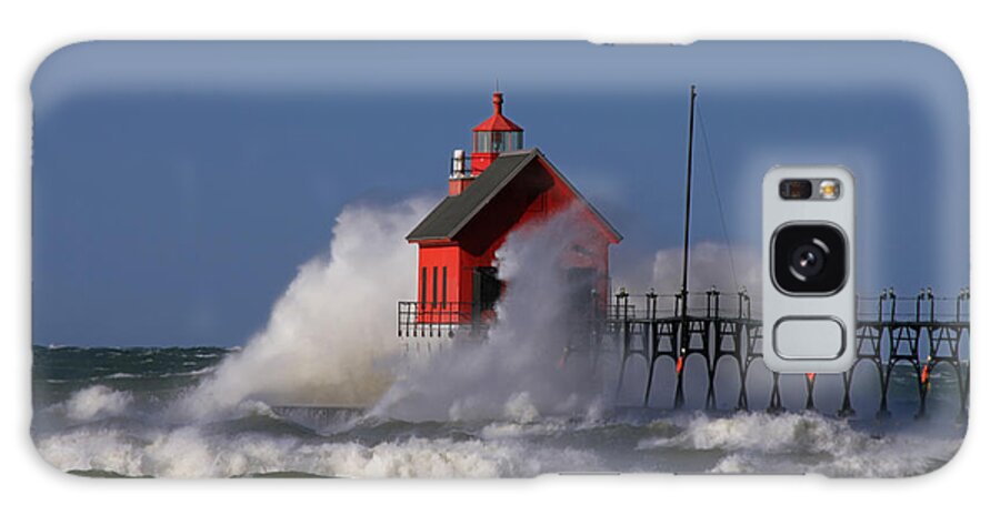 Lighthouse Galaxy Case featuring the photograph Waves Over the Grand Haven Outer Light by Richard Gregurich