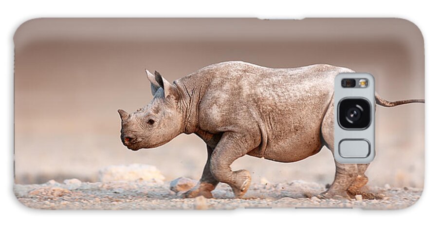 Rhinoceros Galaxy Case featuring the photograph Black Rhinoceros baby running by Johan Swanepoel