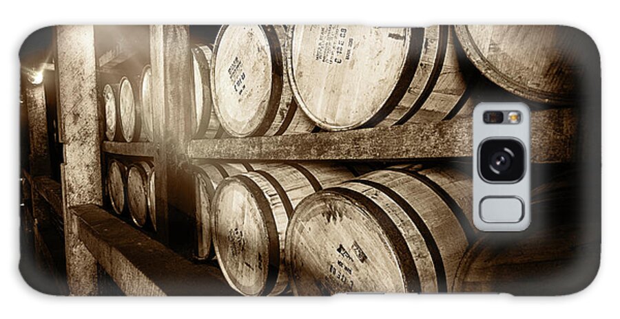 Bourbon Barrel Galaxy Case featuring the photograph Bourbon Barrels in Spotlight by Karen Varnas