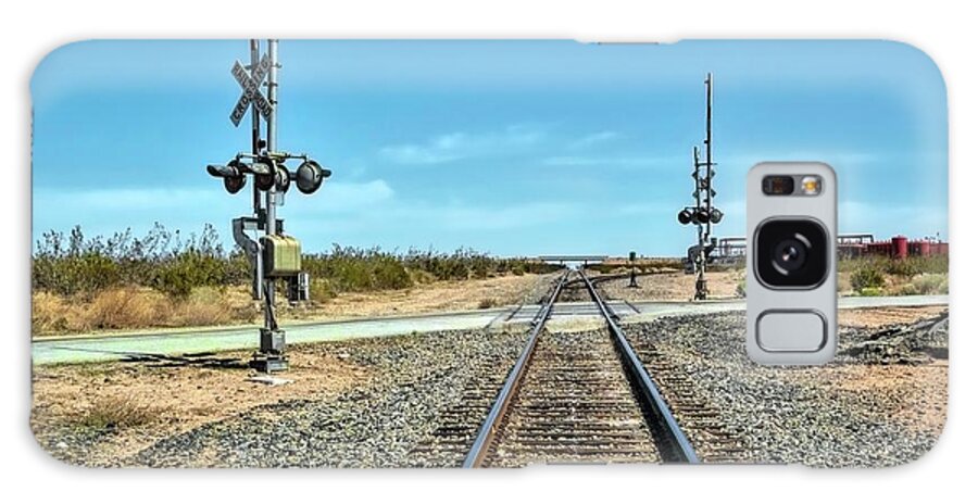 Railway Crossing; Railroad Crossing; Train Crossing; Union Pacific; Freight Train; Yellow; Blue; Green; Red; Water Storage; Train Tracks; Train Signal; Mojave Desert; Mohave Desert; Antelope Valley; Joe Lach Galaxy Case featuring the photograph Desert Railway Crossing by Joe Lach