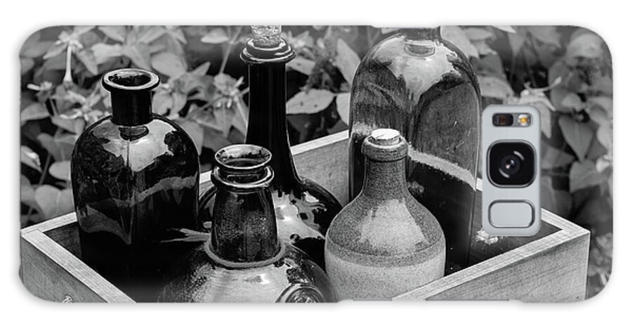 Antique Galaxy Case featuring the photograph Glass Bottles in the Garden by Nicole Lloyd