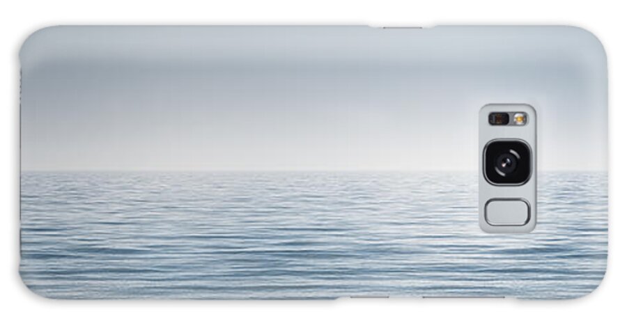 Water Ocean Lake Horizon Blue Monochrome Conceptual Contemplative Waves Infinite Clear Fog Haze Minimal Minimalist Infinity Boundless Far Landscape Wide Panorama Clear Sky Body Of Water No Limit Limitless Manipulated 365 Project Photo A Day Explore Photography Scott Norris Photography Peaceful Galaxy Case featuring the photograph Limitless by Scott Norris