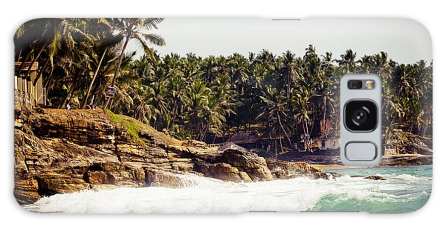 Water Galaxy Case featuring the photograph Ocean wave with Rocky cliffs and Palm trees by Raimond Klavins