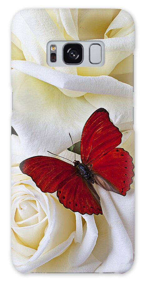 Red Galaxy Case featuring the photograph Red butterfly on white roses by Garry Gay
