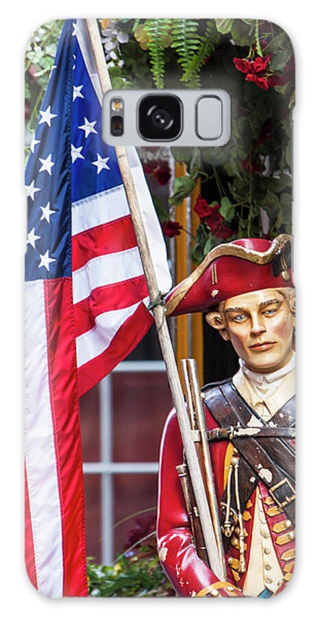 Boston Galaxy Case featuring the photograph Red Coat holding the American flag by Jason Hughes