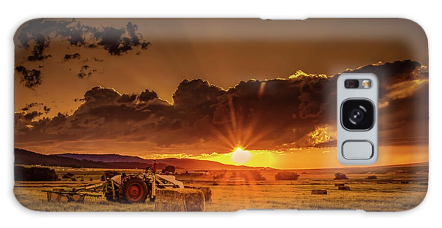 Tractor Galaxy Case featuring the photograph Sunset in the Hay Field by Don Schwartz
