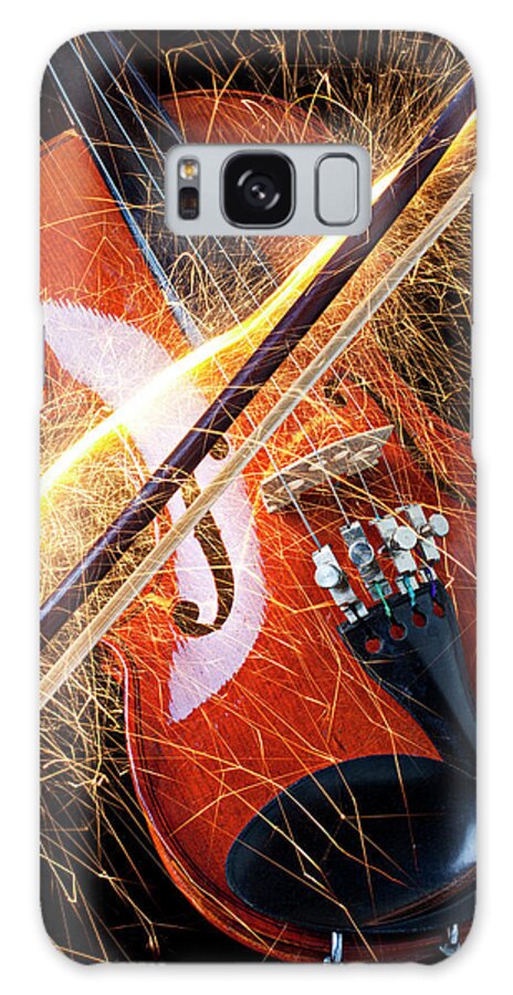 Violin Sparks Flying Bow Music Galaxy Case featuring the photograph Violin with sparks flying from the bow by Garry Gay