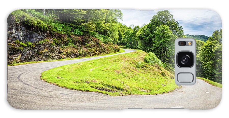 Boussenac Galaxy Case featuring the photograph Winding road with sharp curve going up the mountain by Semmick Photo