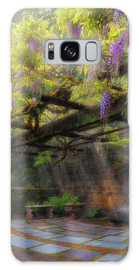 Garden Galaxy Case featuring the photograph Wisteria Flowers Blooming on Trellis over Water Fountain by David Gn