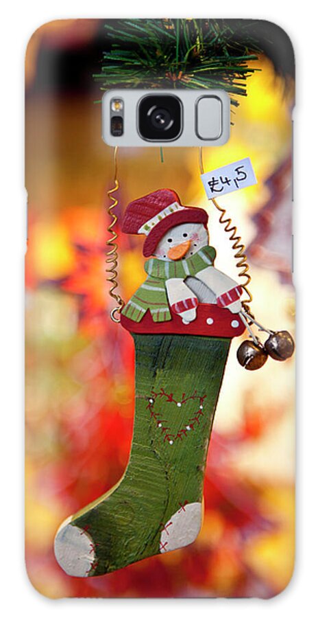 Christmas Stocking And Snowman Ornament At Christmas Market Galaxy Case featuring the photograph 1161-4095 by Robert Harding Picture Library