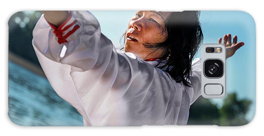 Tai Chi Galaxy Case featuring the photograph Women Practicing Tai Chi By Lake #7 by Microgen Images/science Photo Library
