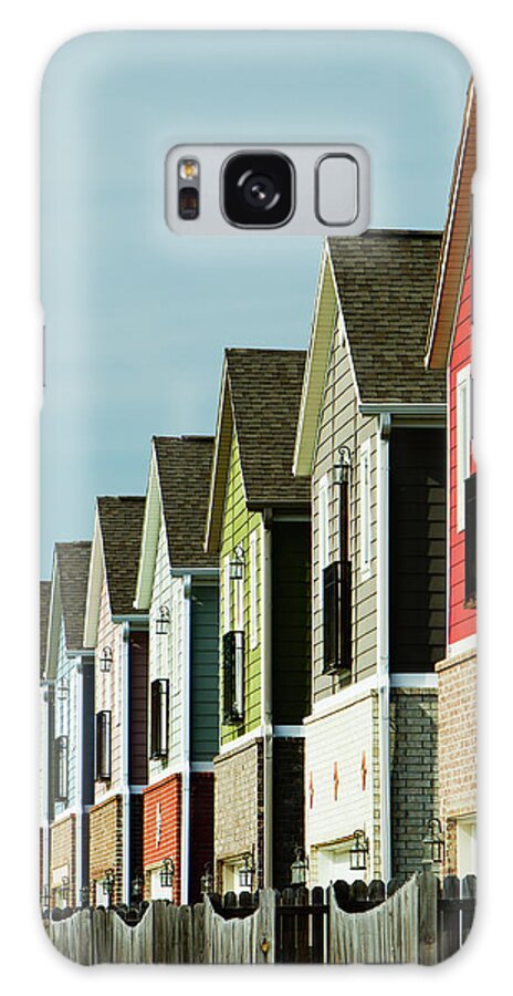 Row House Galaxy Case featuring the photograph A Row Of Colorful Suburban Homes by Wesley Hitt