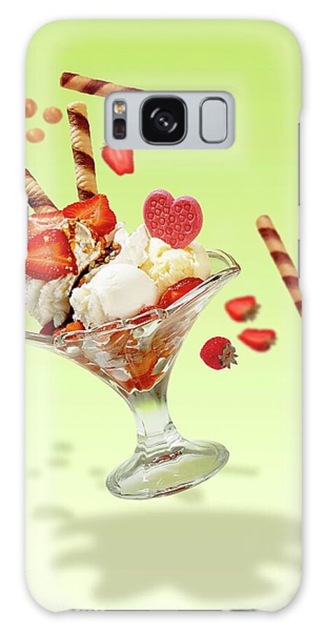 Ip_11157798 Galaxy Case featuring the photograph Action Shot Of An Ice Cream Sundae With Vanilla Ice Cream, Lemon Ice Cream, Cream And Fresh Strawberries by Imagerie