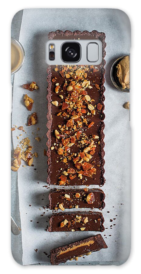 Ip_12411301 Galaxy Case featuring the photograph Chocolate And Peanut Butter Tart With Peanut Praline, View From Above by Magdalena Hendey