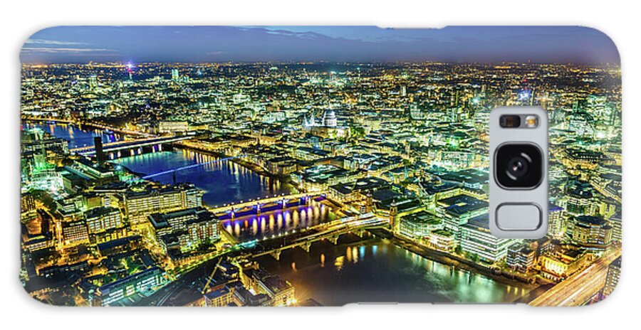 London Millennium Footbridge Galaxy Case featuring the photograph City Of London At Dusk, London, Uk by Mbbirdy