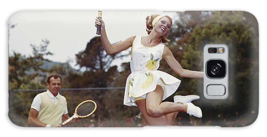 #faatoppicks Galaxy Case featuring the photograph Couple On Tennis Court, Woman Jumping by Tom Kelley Archive