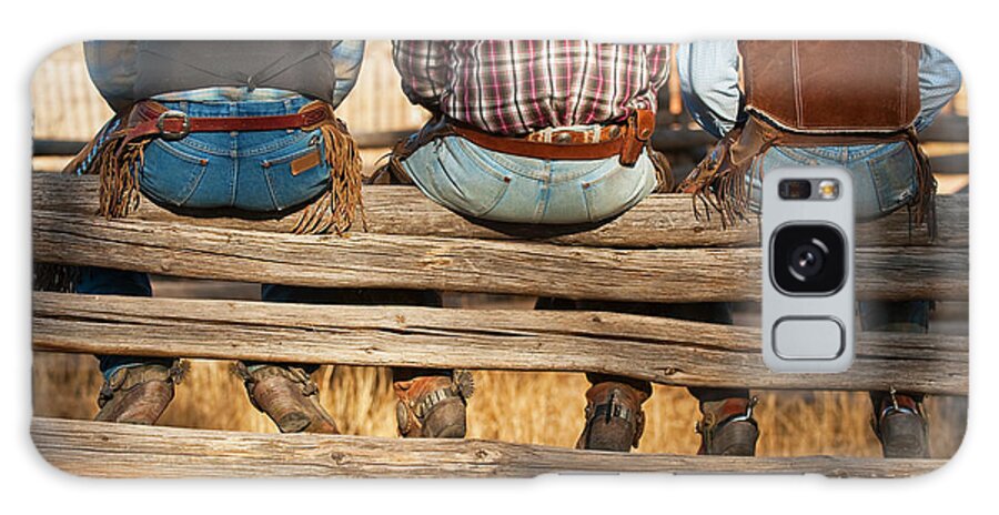 Working Galaxy Case featuring the photograph Cowboys Sitting On Fence by Tetra Images