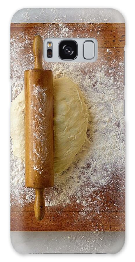 Rolling Pin Galaxy Case featuring the photograph Dough On Cutting Board by Brian Macdonald