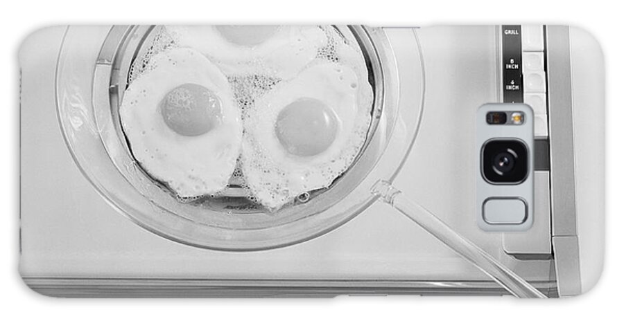 Electric Stove Burner Galaxy Case featuring the photograph Egg Frying In Electric Hob, Close-up by Tom Kelley Archive