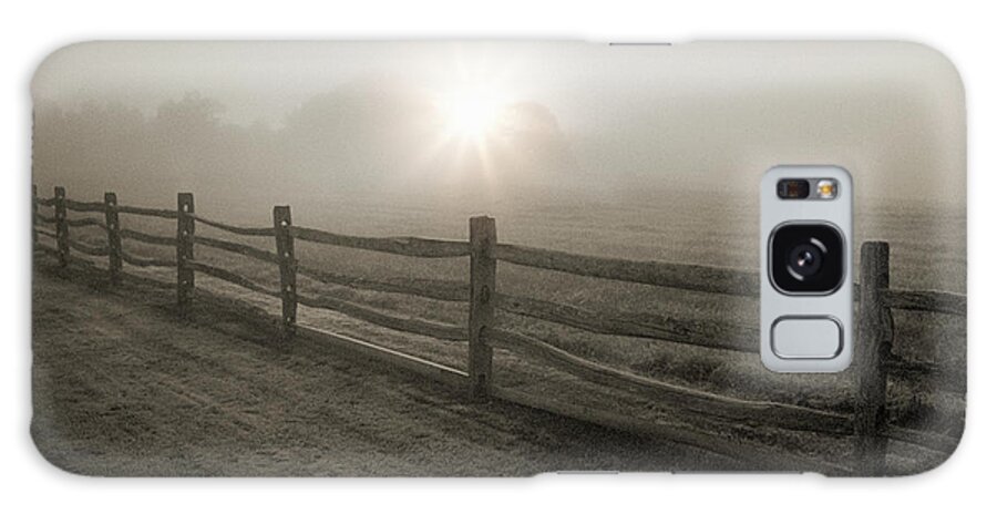 Tranquility Galaxy Case featuring the photograph Fence And Sunburst Through Fog Near by Alvis Upitis