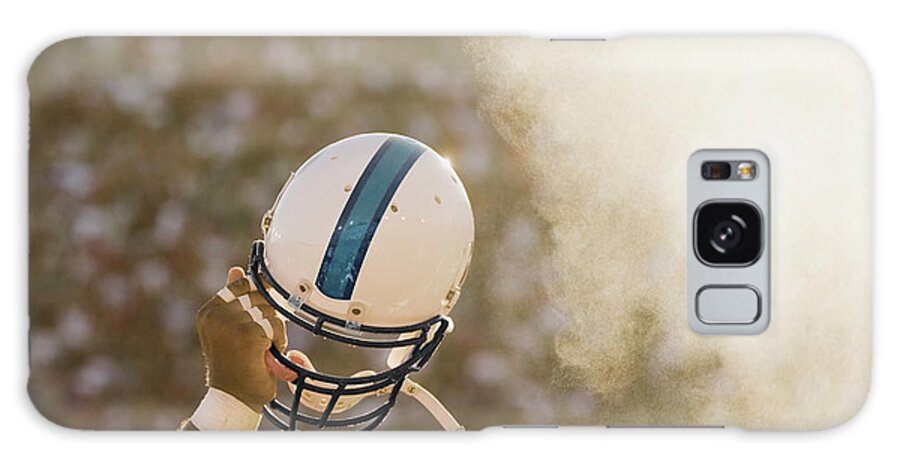 Celebration Galaxy Case featuring the photograph Football Player Waving Helmet In Air by David Madison