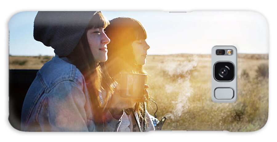 Friends Galaxy Case featuring the photograph Friends Sitting On Pick-up Truck Against Clear Sky by Cavan Images
