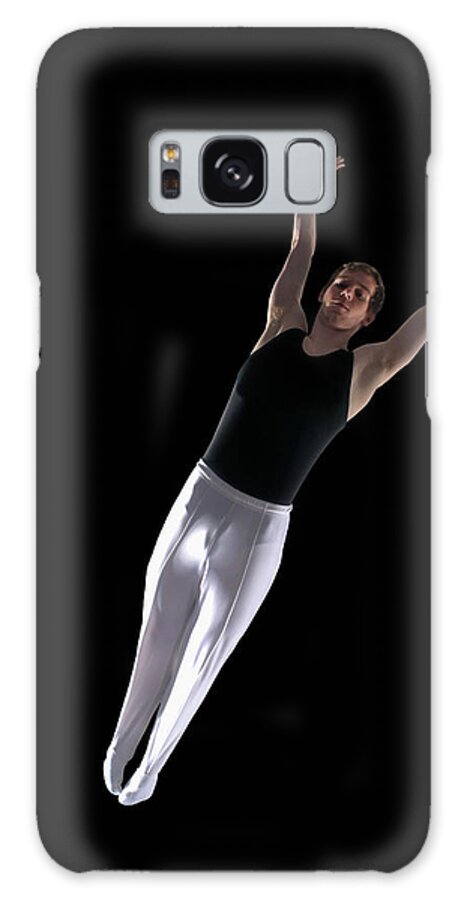 Human Arm Galaxy Case featuring the photograph Gymnast Outstretched In Mid Air by Peter Muller
