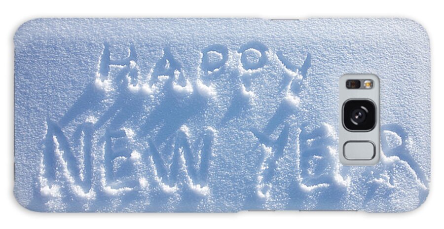 Holiday Galaxy Case featuring the photograph Happy New Year Written In Snow by Jakob Helbig
