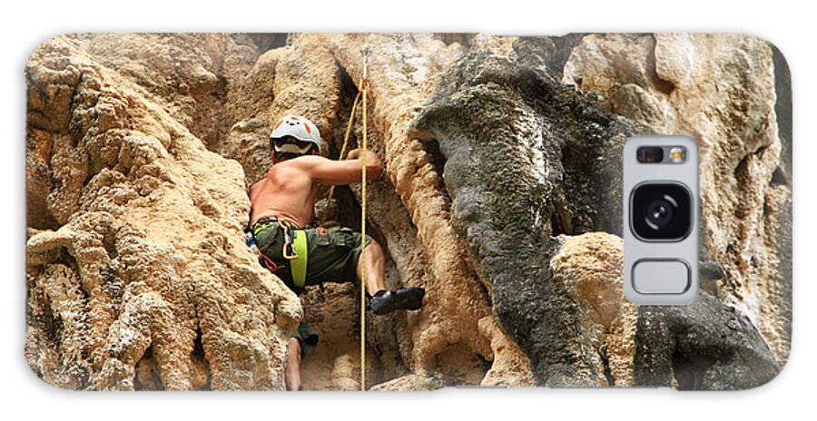 Sports Helmet Galaxy Case featuring the photograph Man Climbing Rock by Nisa And Ulli Maier Photography
