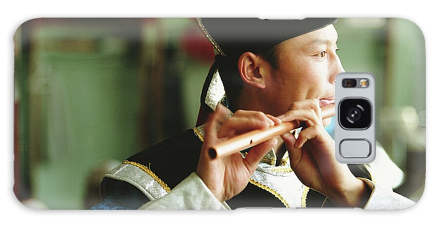 Mongolian Culture Galaxy Case featuring the photograph Man Playing Flute In Theatre, Profile by Peter Adams