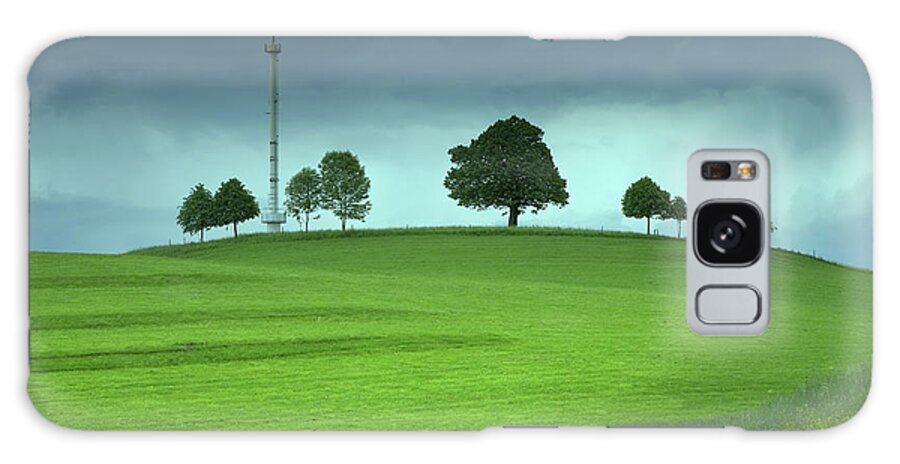 Mobile Phone Base Station Galaxy Case featuring the photograph Mobile Phone Antennae On A Green Field by Bkindler