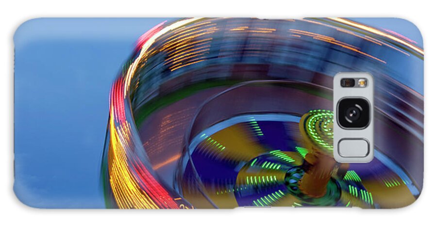 Carousel Galaxy Case featuring the photograph Multicolored Spinning Carnival Ride by By Ken Ilio