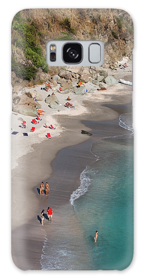 Water's Edge Galaxy Case featuring the photograph People Relax On Shell Beach by Holger Leue