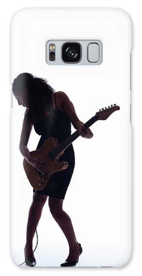 Expertise Galaxy Case featuring the photograph Silhouette Of Woman Playing Guitar by Pm Images
