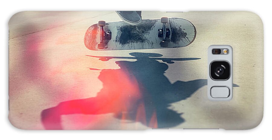 Cool Attitude Galaxy Case featuring the photograph Skateboarder Doing An Ollie by Devon Strong