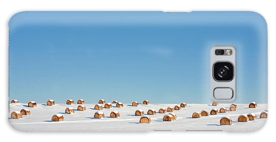 Round Bales Galaxy Case featuring the photograph Snow Covered Rounds by Todd Klassy