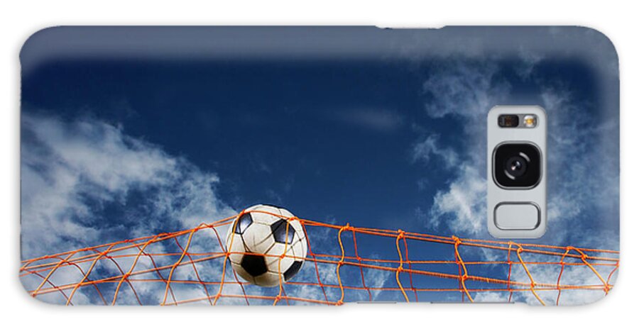Working Galaxy Case featuring the photograph Soccer Ball Going Into Goal Net by Fuse