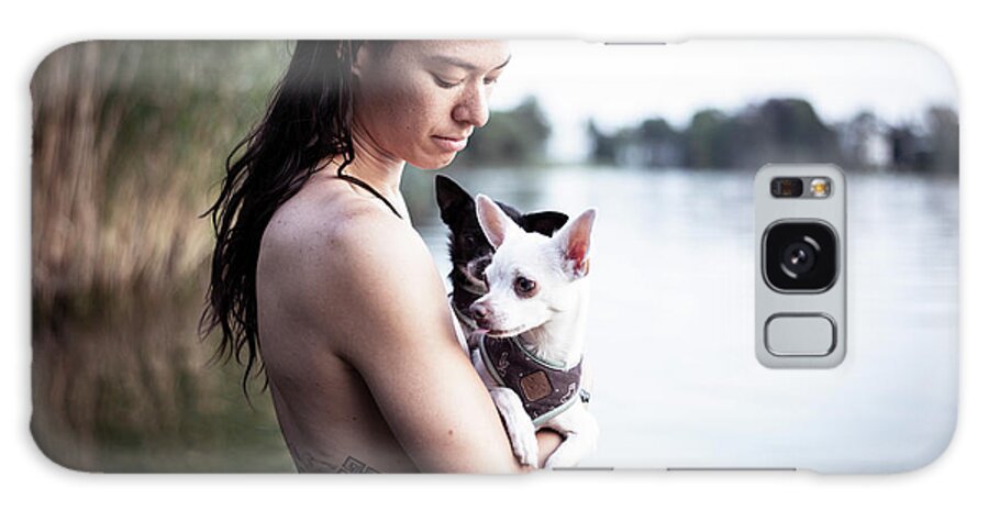 Brothers Galaxy Case featuring the photograph Strong Asian Woman Holds Two Small Dogs In Natural Berlin Lake by Cavan Images