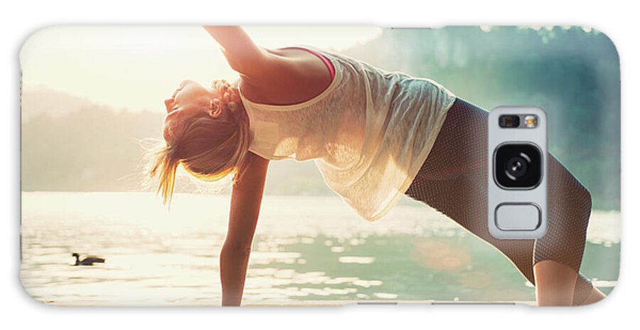Yoga Galaxy Case featuring the photograph Sunset Yoga By The Water by Microgen Images/science Photo Library