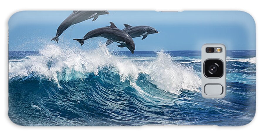Beauty Galaxy Case featuring the photograph Three Beautiful Dolphins Jumping by Willyam Bradberry