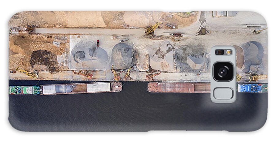 Seaport Galaxy Case featuring the photograph Top Down Aerial View Of Vessels Unloading Sand In Seaport by Cavan Images