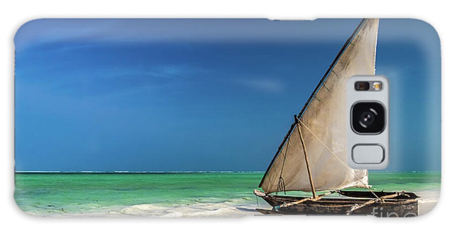Fishing Boat Galaxy Case featuring the photograph Traditional fishing boat on the beach by Lyl Dil Creations