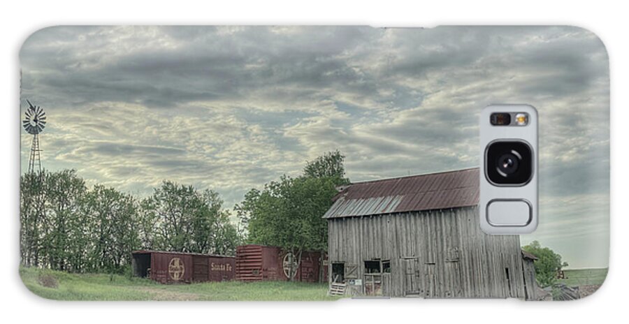 Clouds Galaxy Case featuring the photograph Train Cars and a Barn by Laura Hedien