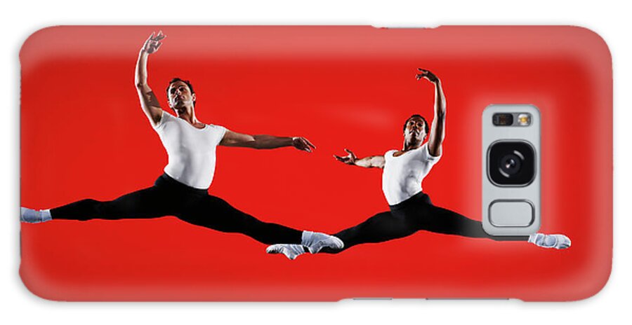 Young Men Galaxy Case featuring the photograph Two Male Ballet Dancers Leaping On Stage by Thomas Barwick