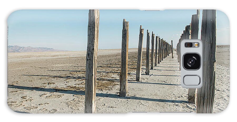 Wooden Posts Galaxy Case featuring the photograph Wooden Posts At Great Salt Lake Against Clear Sky by Cavan Images
